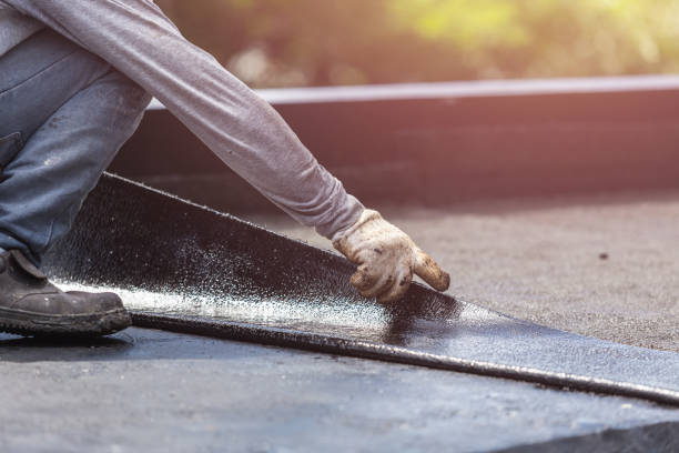 Professional Basement Waterproofing technician working in Spencerville, IN